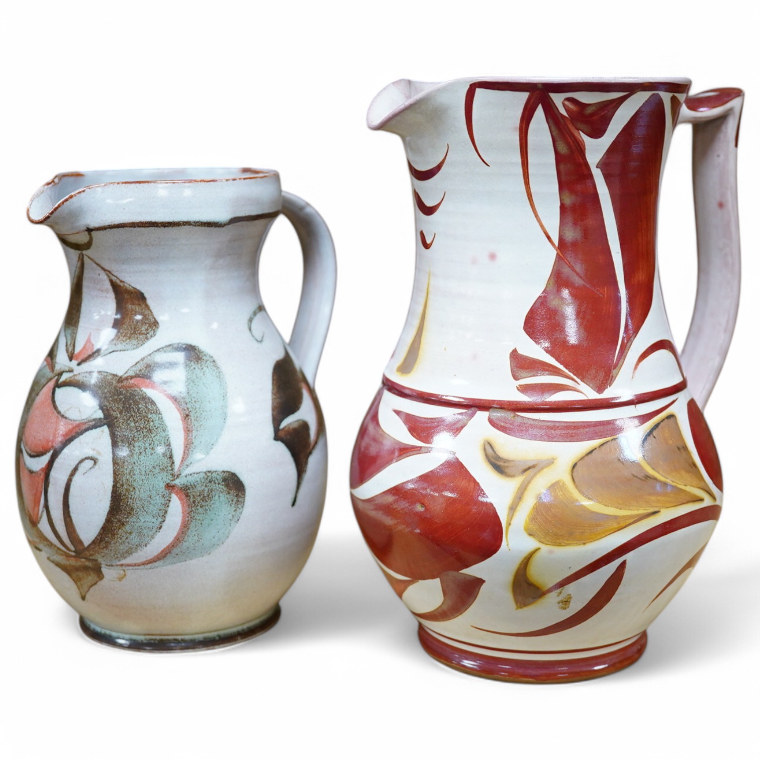 Alan Caiger-Smith (1930-2020), an Aldermaston Pottery lustre glazed jug and another, tallest 22cm. Condition - good